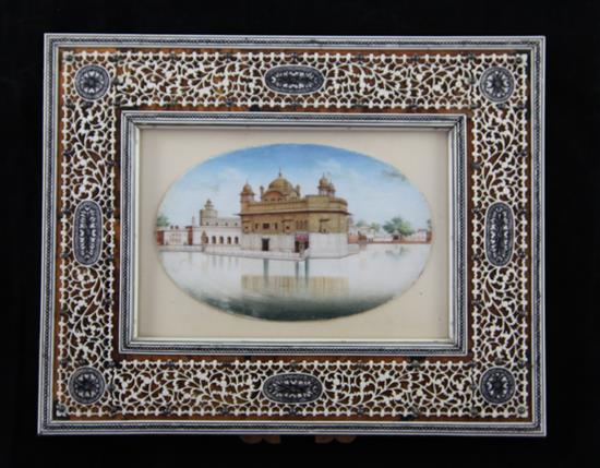 An early 20th century Indian ivory miniature of The Golden Temple, 3 x 4.75in. in ivory overlaid tortoiseshell frame 7 x 8.5in.